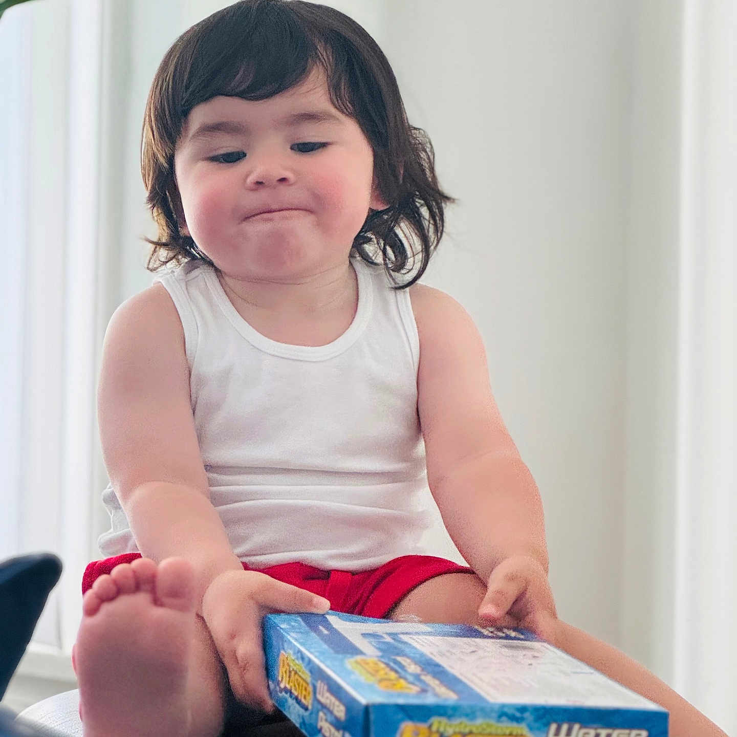 Charlie joined the competition — help win amazing prizes! baby, bodypart, box, child, face, female, finger, girl, hand, happy, head, herbal, person, photography, plant, portrait, pottedplant, reading, sitting, smile