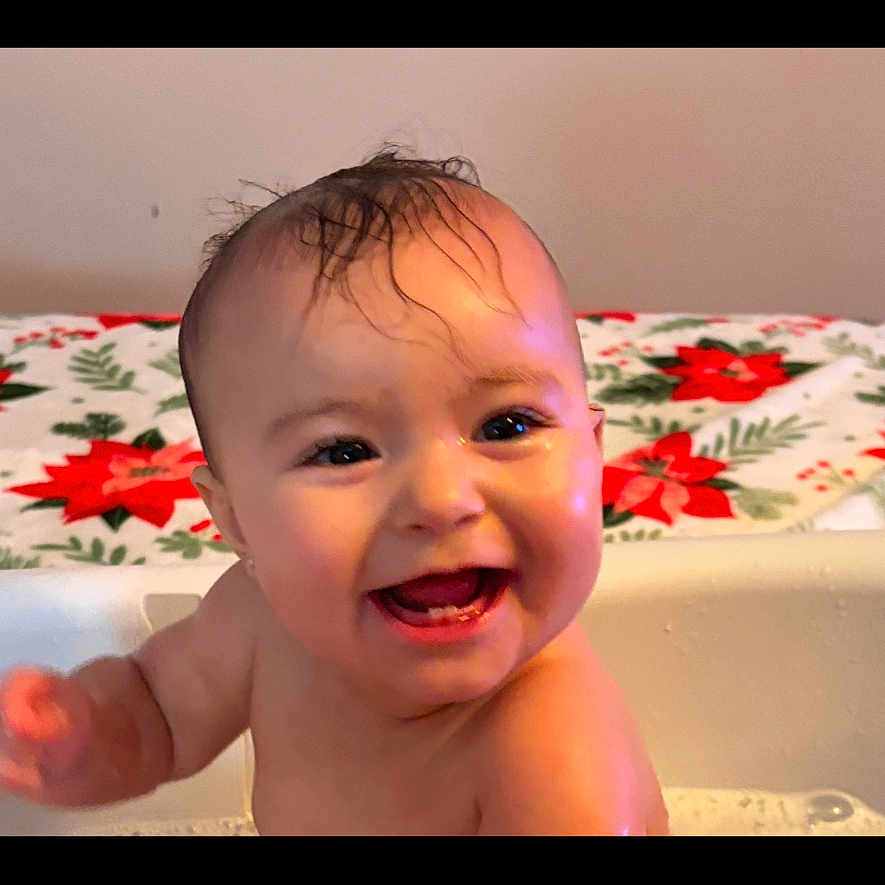 Selena joined the competition — help win amazing prizes! baby, bathing, bathtub, bodypart, cream, dessert, face, finger, food, hand, happy, head, mouth, newborn, person, photography, portrait, smile, teeth, tub