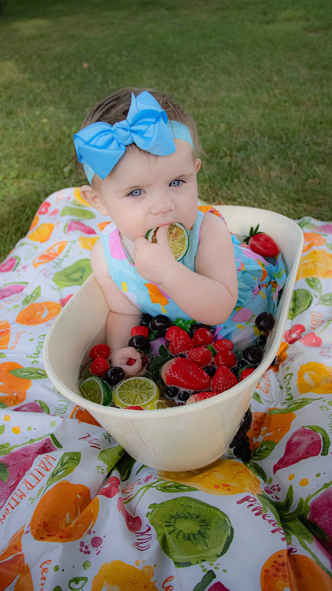 Lilliana joined the competition — help win amazing prizes! baby, baby_toddler_clothing, bowl, cap, child, dishware, food, fruit, grape, grass, hat, headwear, natural_foods, pattern, person, plant, plate, recipe, serveware, sweetness