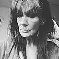Corinne R.