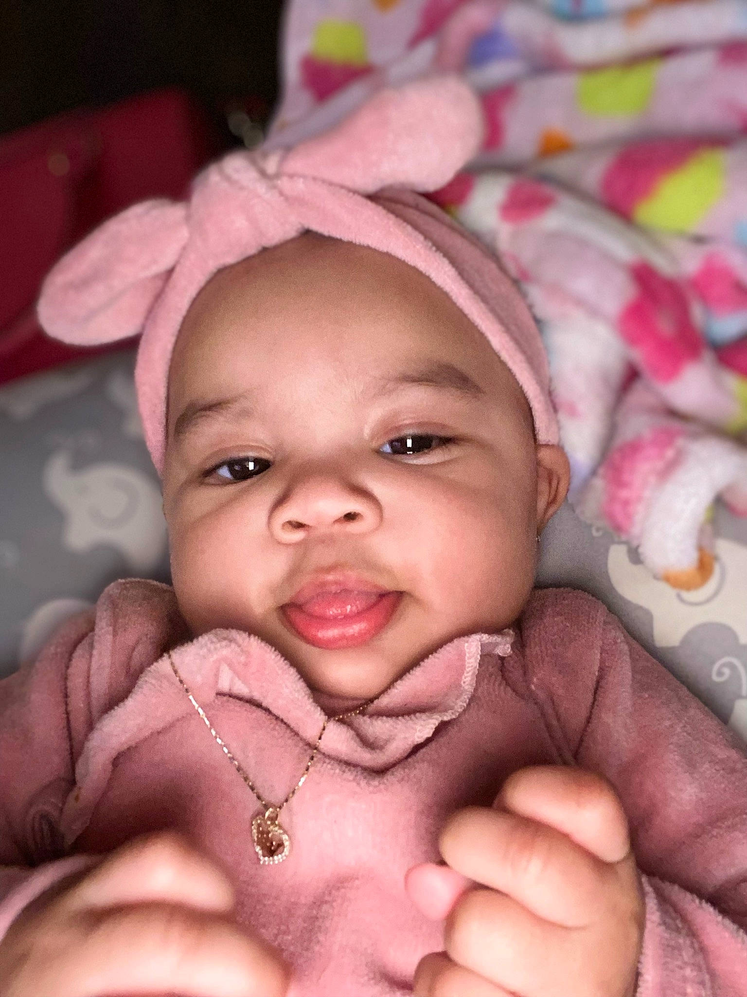 Mia joined the competition — help win amazing prizes! baby, cheek, eye, eyebrow, eyelash, face, finger, gesture, hand, happy, head, headwear, iris, lip, mouth, nose, person, pink, skin, smile