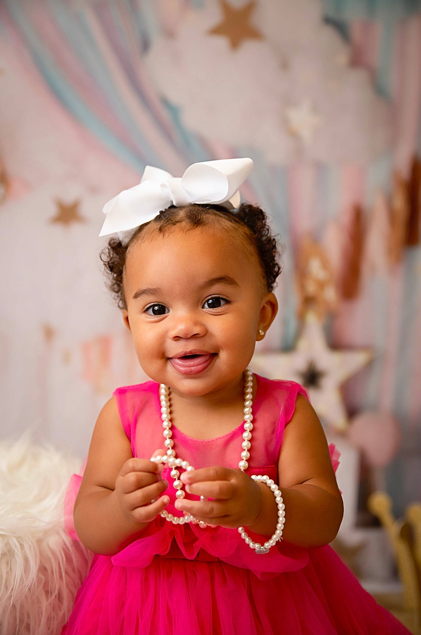 Mia is registered to the contest to win money with this photo: baby, baby_toddler_clothing, beauty, child, dress, event, eyelash, flash_photography, fun, hairstyle, happy, headgear, joy, magenta, person, photograph, pink, purple, skin, smile