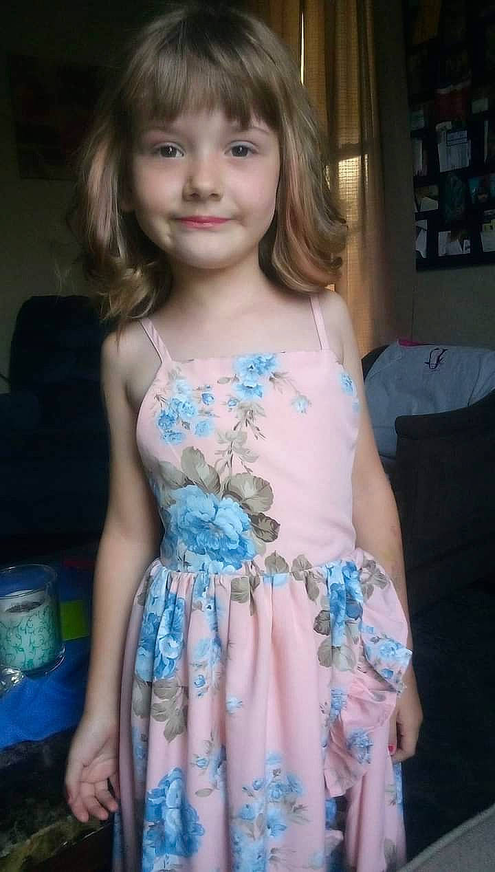 Everly joined the competition — help win amazing prizes! baby_toddler_clothing, bangs, brown_hair, child, day_dress, dress, electric_blue, eye, formal_wear, hair, head, iris, joy, one_piece_garment, pattern, person, plant, shoulder, skin, sleeve