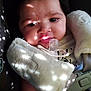 Jada joined the competition — help win amazing prizes! baby, blanket, car_seat, child, closeup, clothing, cute, expression, face, head, indoors, infant, pacifier, portrait, seatbelt, shadow, sitting, skin, soft_texture, sunlight