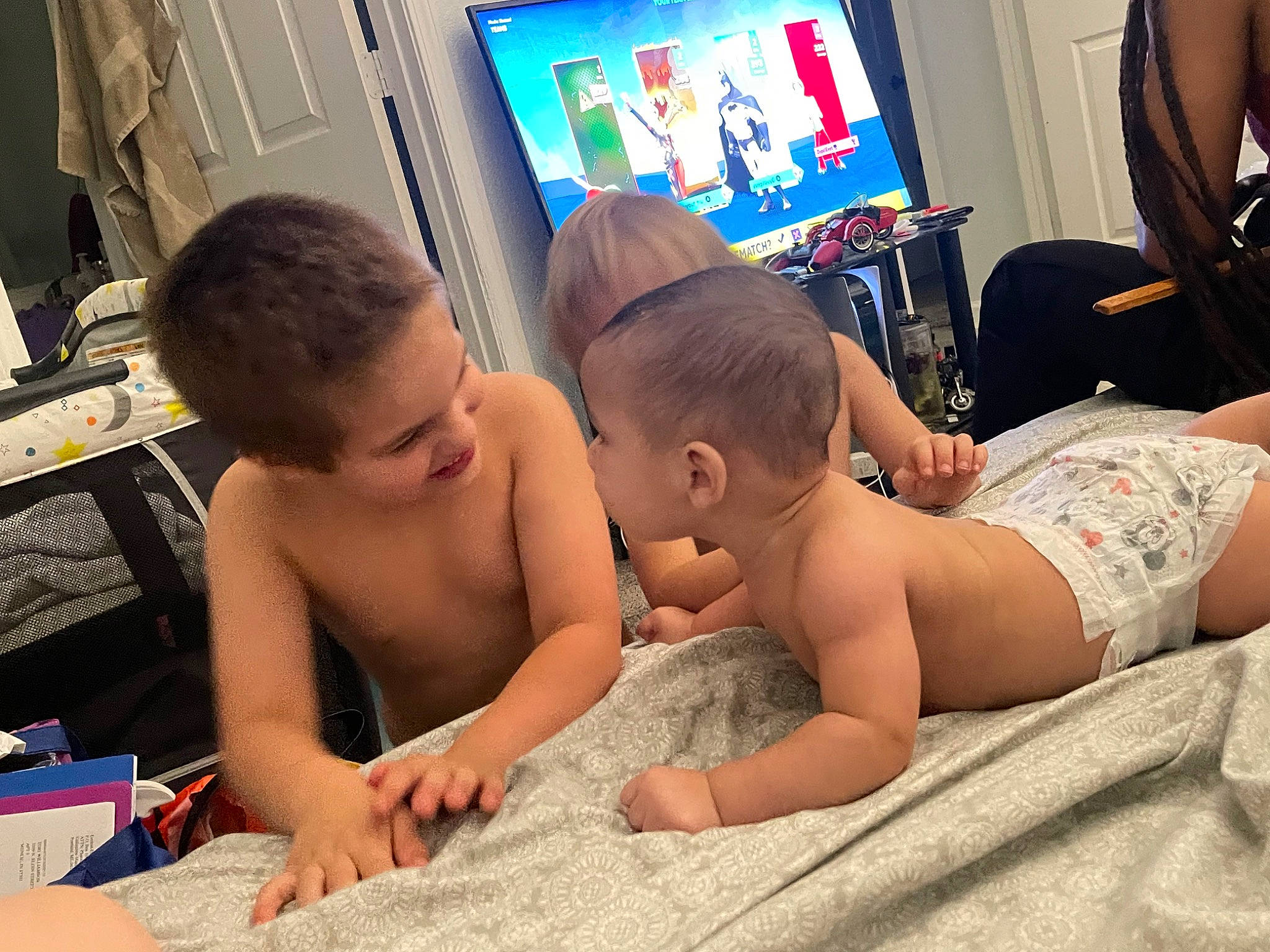 Bentlee is registered to the contest to win money with this photo: abdomen, baby, barechested, barefoot, chest, child, comfort, finger, flooring, foot, fun, hairstyle, happy, leisure, muscle, person, sitting, thigh, thumb, toddler