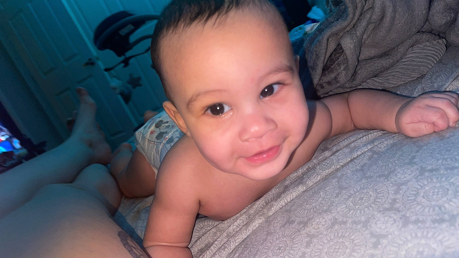 Denzel is registered to the contest to win money with this photo: arm, azure, baby, cheek, ear, eye, eyebrow, facial_expression, flash_photography, forehead, gesture, hand, iris, joy, lip, mouth, muscle, nose, organ, person