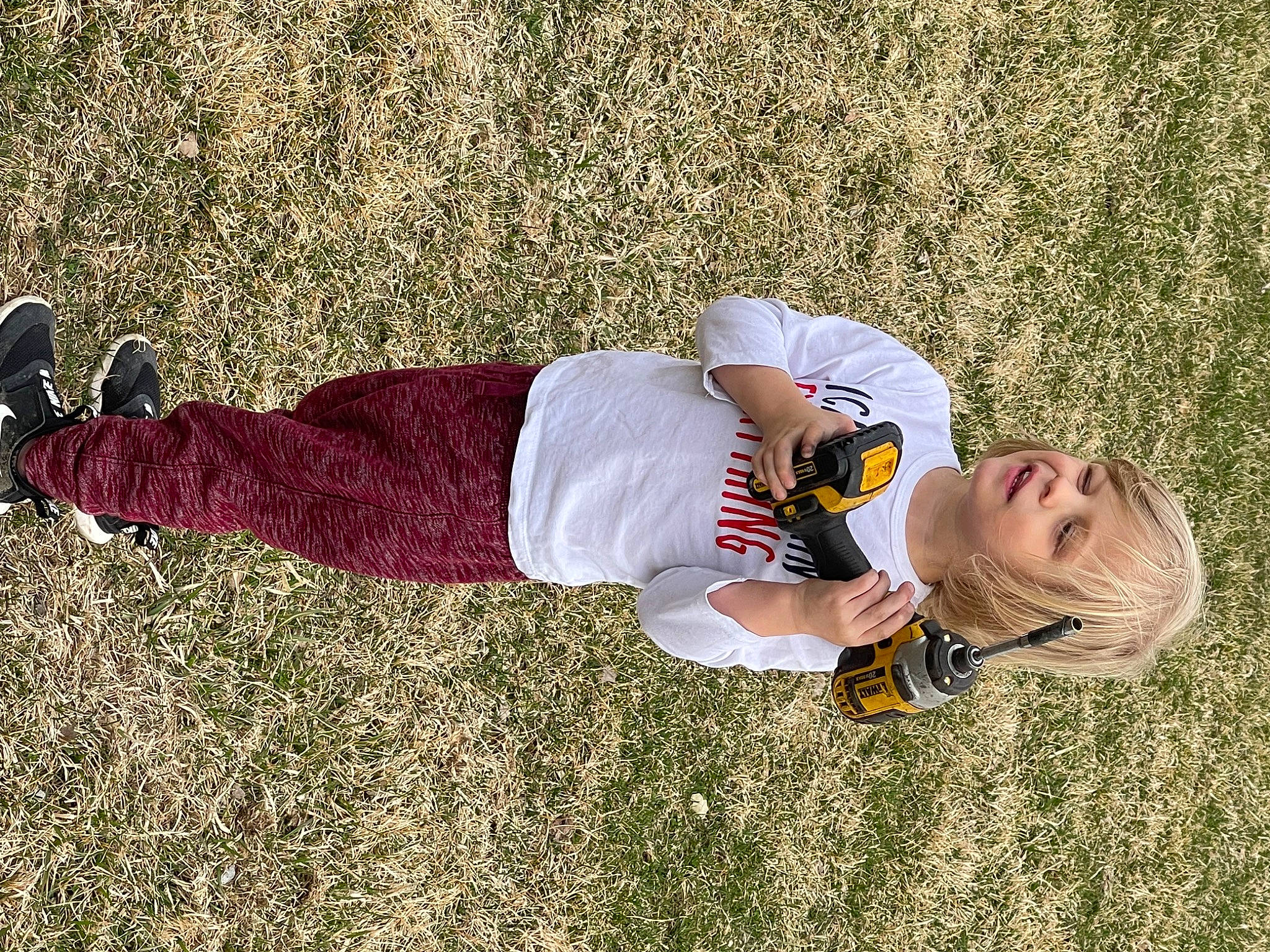 Benjiman is registered to the contest to win money with this photo: fun, grass, grass_family, grassland, happy, hat, human_leg, joint, knee, lawn, leg, leisure, people_in_nature, person, plant, player, recreation, shadow, soil, t_shirt