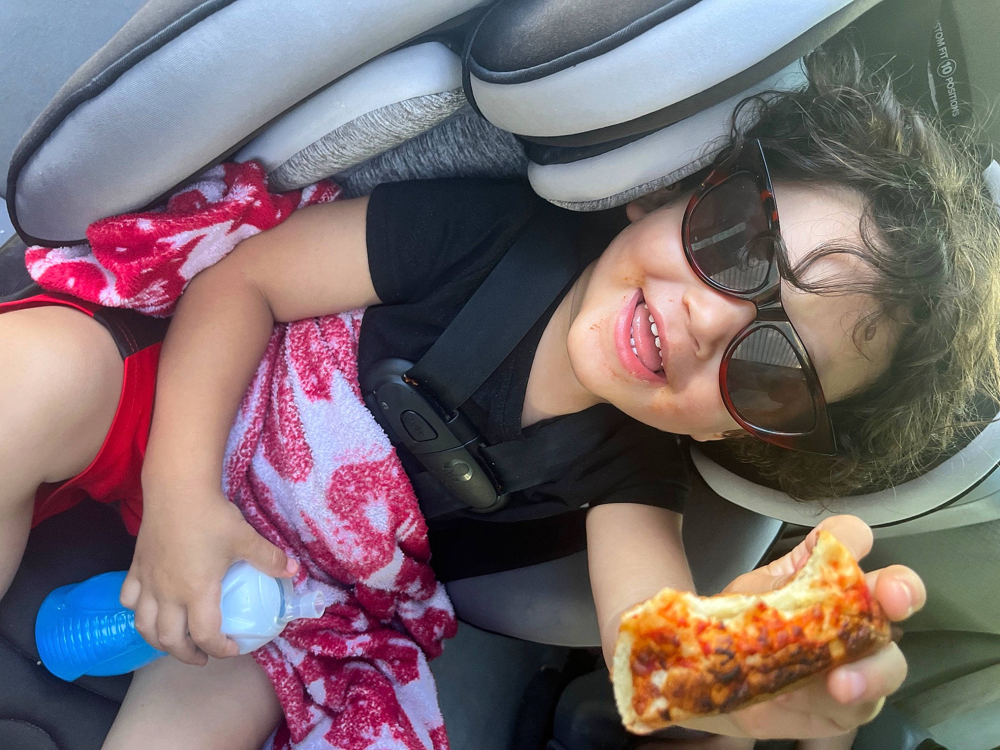 Josiah joined the competition — help win amazing prizes! arm, child, finger, gesture, goggles, hand, happy, human_body, leg, mouth, nail, person, pink, skin, smile, sunglasses, thigh, thumb, vision_care, white