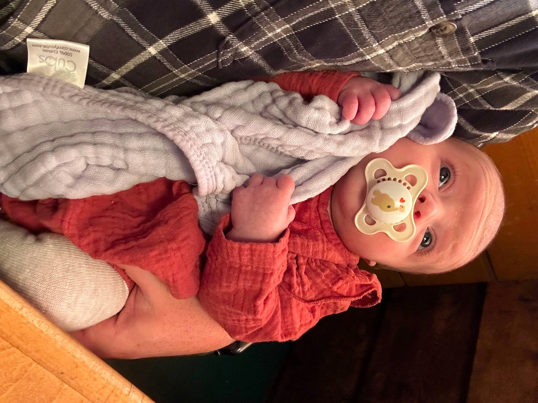Hadley joined the competition — help win amazing prizes! baby, baby_products, baby_toddler_clothing, child, comfort, finger, gesture, happy, human_leg, linens, nail, pattern, person, pink, plaid, sleeve, tartan, textile, thigh, thumb