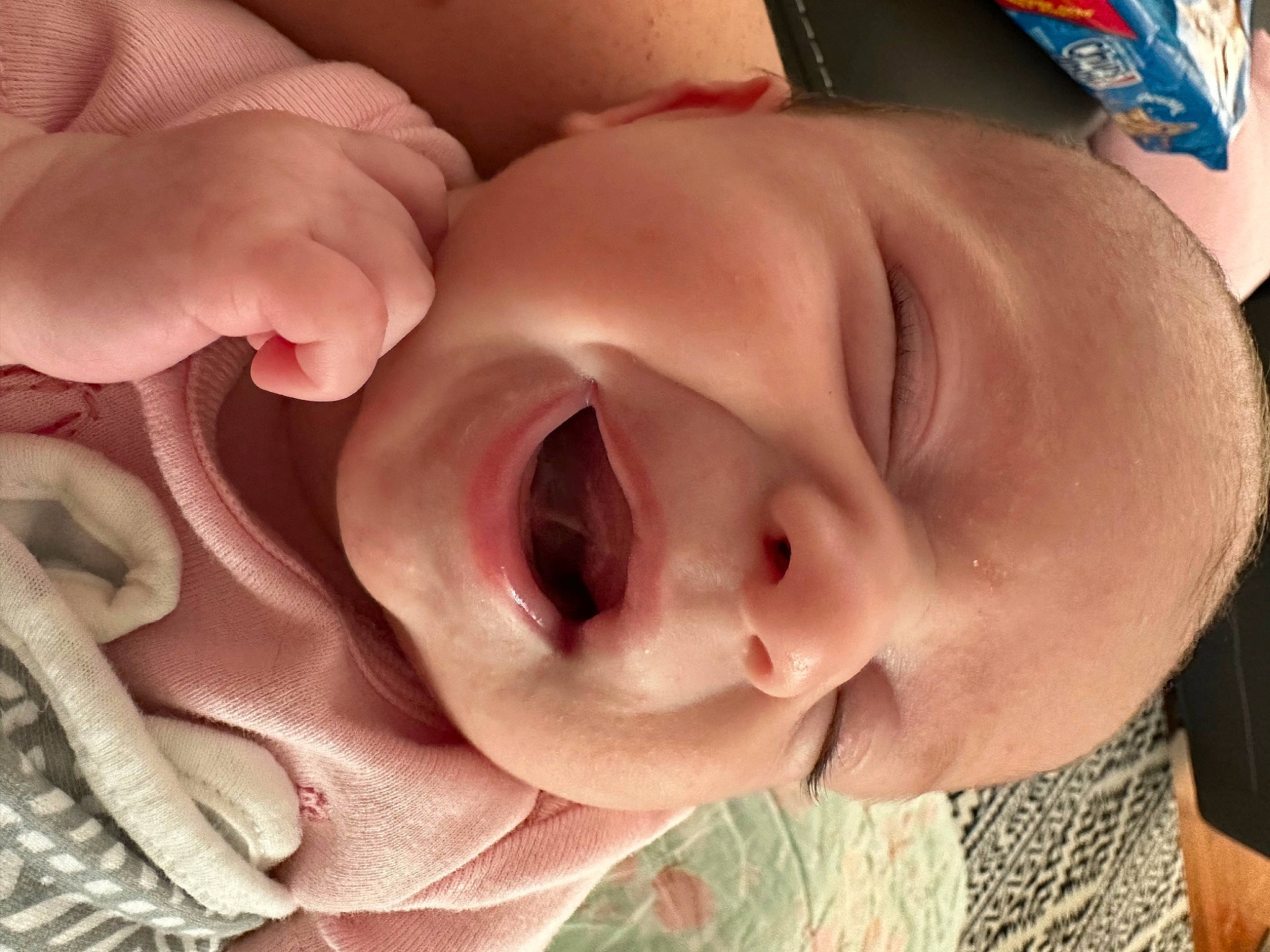 Hadley is registered to the contest to win money with this photo: baby, cheek, chin, ear, eye, eyebrow, eyelash, finger, gesture, happy, headgear, iris, jaw, lip, mouth, neck, nose, person, pink, skin
