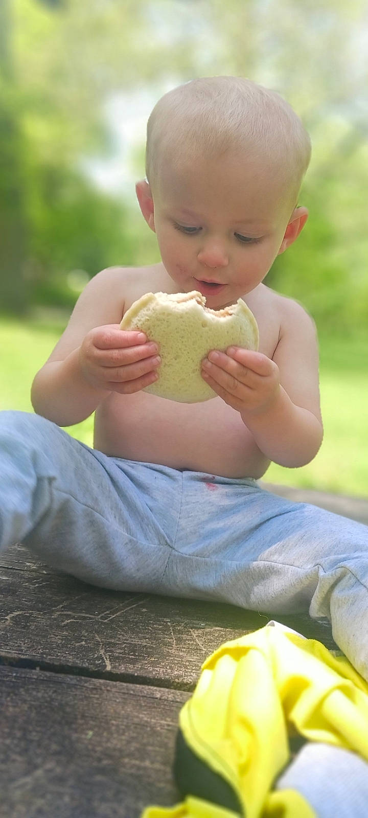 Aiden is registered to the contest to win money with this photo: abdomen, baby, ball, child, finger, grass, hand, happy, human_body, human_leg, knee, leisure, people_in_nature, person, photograph, skin, summer, thigh, thumb, toddler