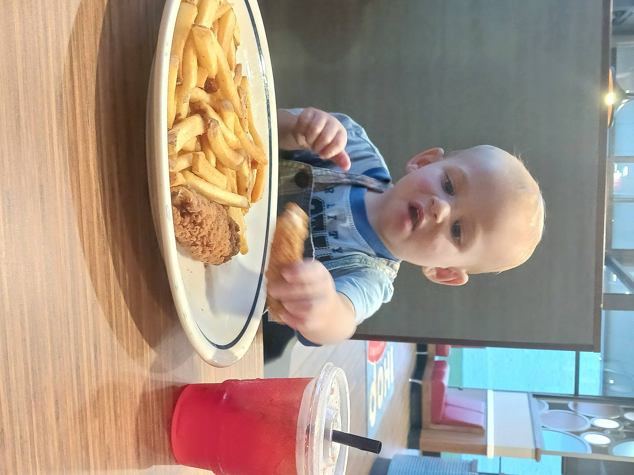 Aiden is registered to the contest to win money with this photo: art, automotive_wheel_system, baby, bigoli, child, circle, comfort_food, cuisine, desk, dish, food, ingredient, machine, person, recipe, room, smile, table, tableware, toddler