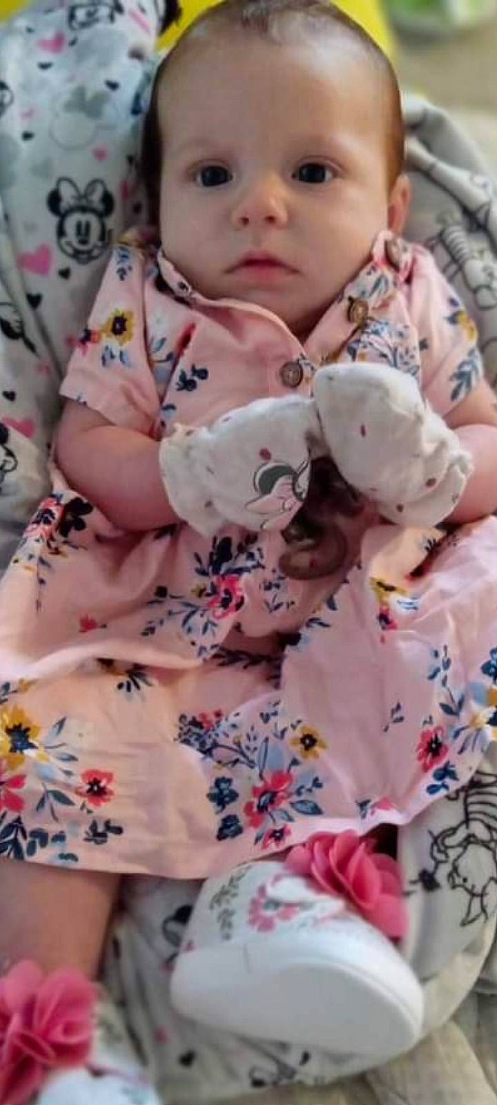 Hadley is registered to the contest to win money with this photo: baby_toddler_clothing, blossom, child, day_dress, flower, happy, linens, nightwear, pattern, peach, person, petal, pink, plant, skin, sleeve, textile, thigh, toddler, vintage_clothing