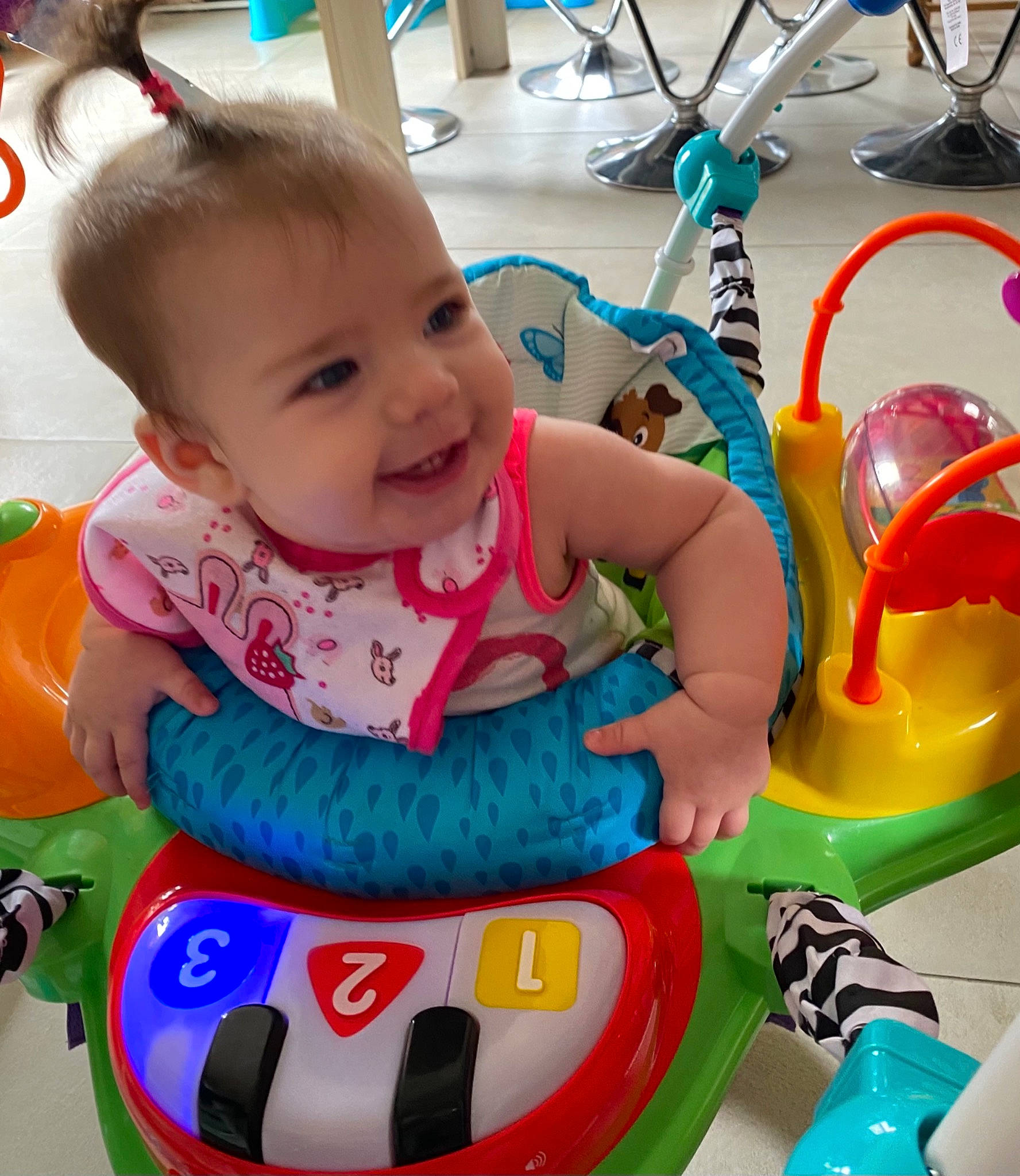 Bella participe au concours pour gagner de l'argent avec cette photo : amusement_ride, baby, baby_playing_with_toys, baby_products, baby_toddler_clothing, baby_toys, blue, bumper, child, event, fun, happy, leisure, person, recreation, riding_toy, smile, toddler, toy, white