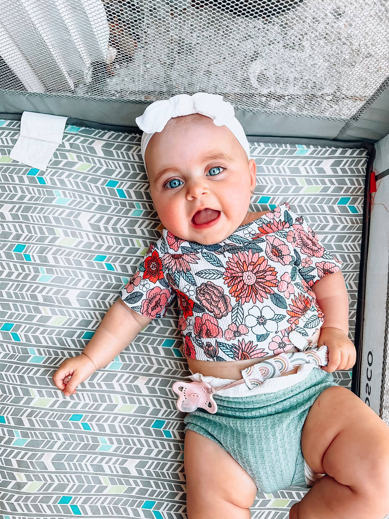 Breelyn joined the competition — help win amazing prizes! baby, baby_toddler_clothing, chair, comfort, eye, flash_photography, fun, happy, human_leg, knee, mouth, pattern, person, pink, purple, room, sitting, skin, smile, thigh