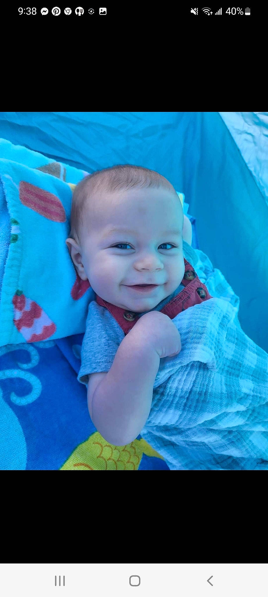 Cian is registered to the contest to win money with this photo: aqua, baby, baby_toddler_clothing, cheek, child, chin, cool, electric_blue, eye, flash_photography, fun, grass, happy, iris, magenta, person, plant, sleeve, smile, t_shirt