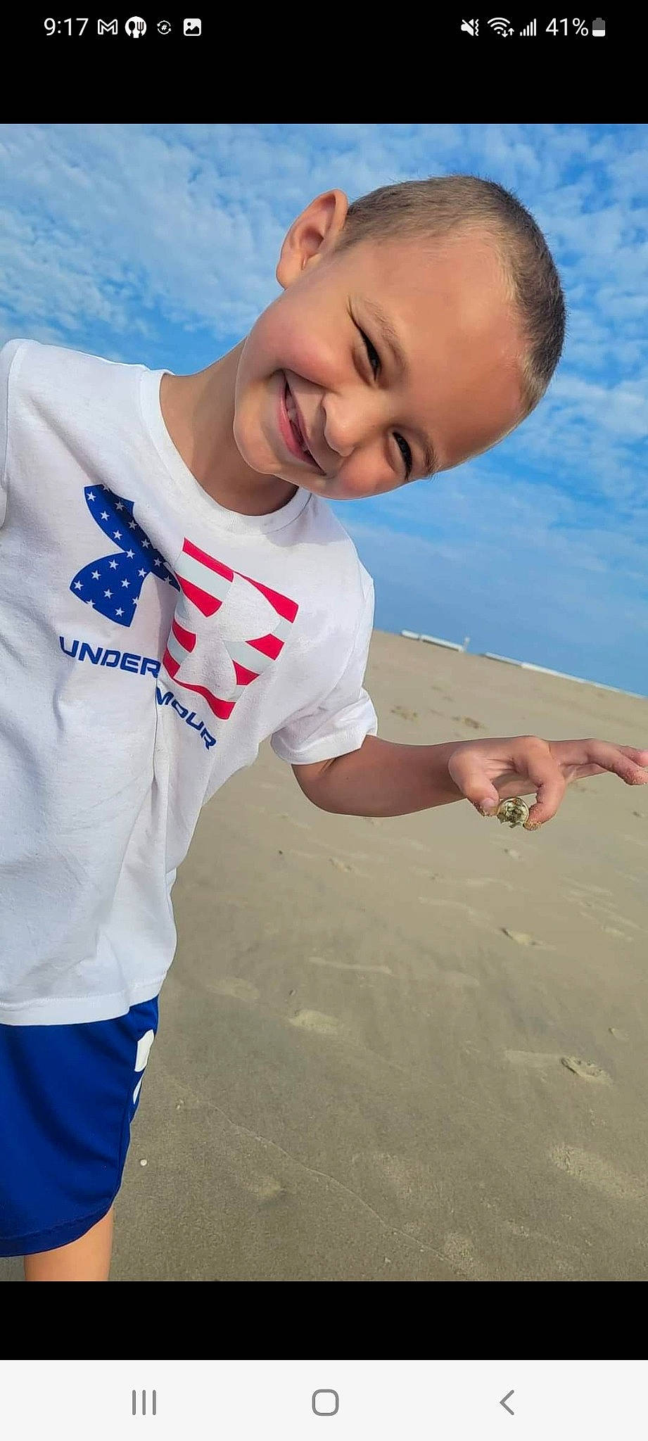 Declan joined the competition — help win amazing prizes! arm, azure, beach, cloud, cool, fun, gesture, happy, head, joy, leisure, people_in_nature, people_on_beach, person, recreation, sand, sky, smile, t_shirt, toddler