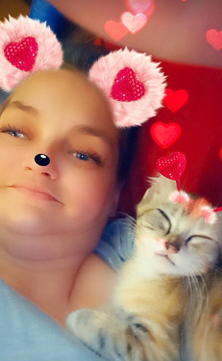 Doja Kat joined the competition — help win amazing prizes! cap, carnivore, cat, child, close_up, eyelash, fashion_accessory, felidae, fur, happy, headband, headpiece, iris, petal, plant, skin, small_to_medium_sized_cats, textile, toddler, whiskers