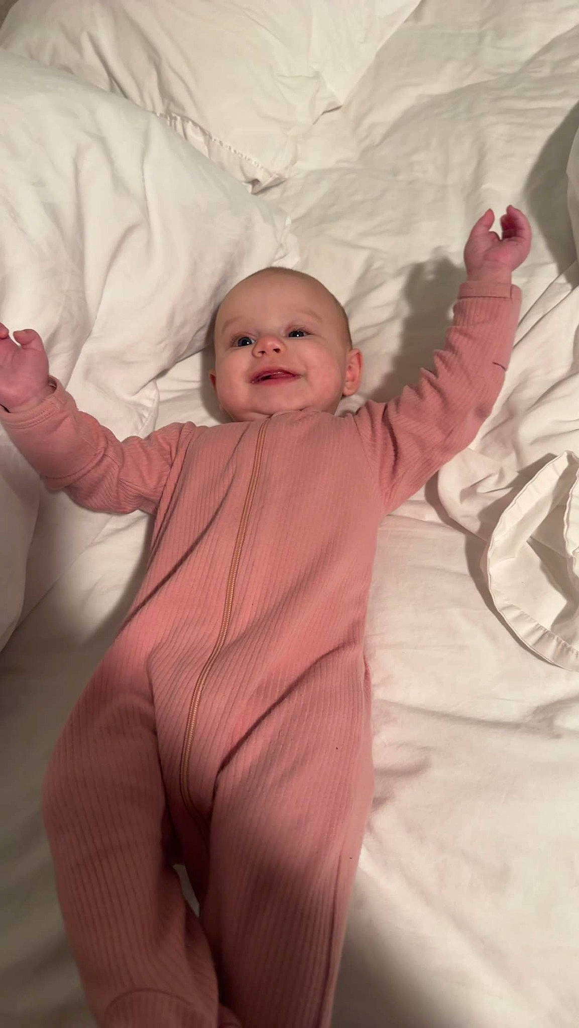 Riley joined the competition — help win amazing prizes! baby, baby_toddler_clothing, cheek, comfort, eye, face, finger, fun, gesture, happy, head, joy, linens, mouth, nose, person, pink, skin, sleeve, smile