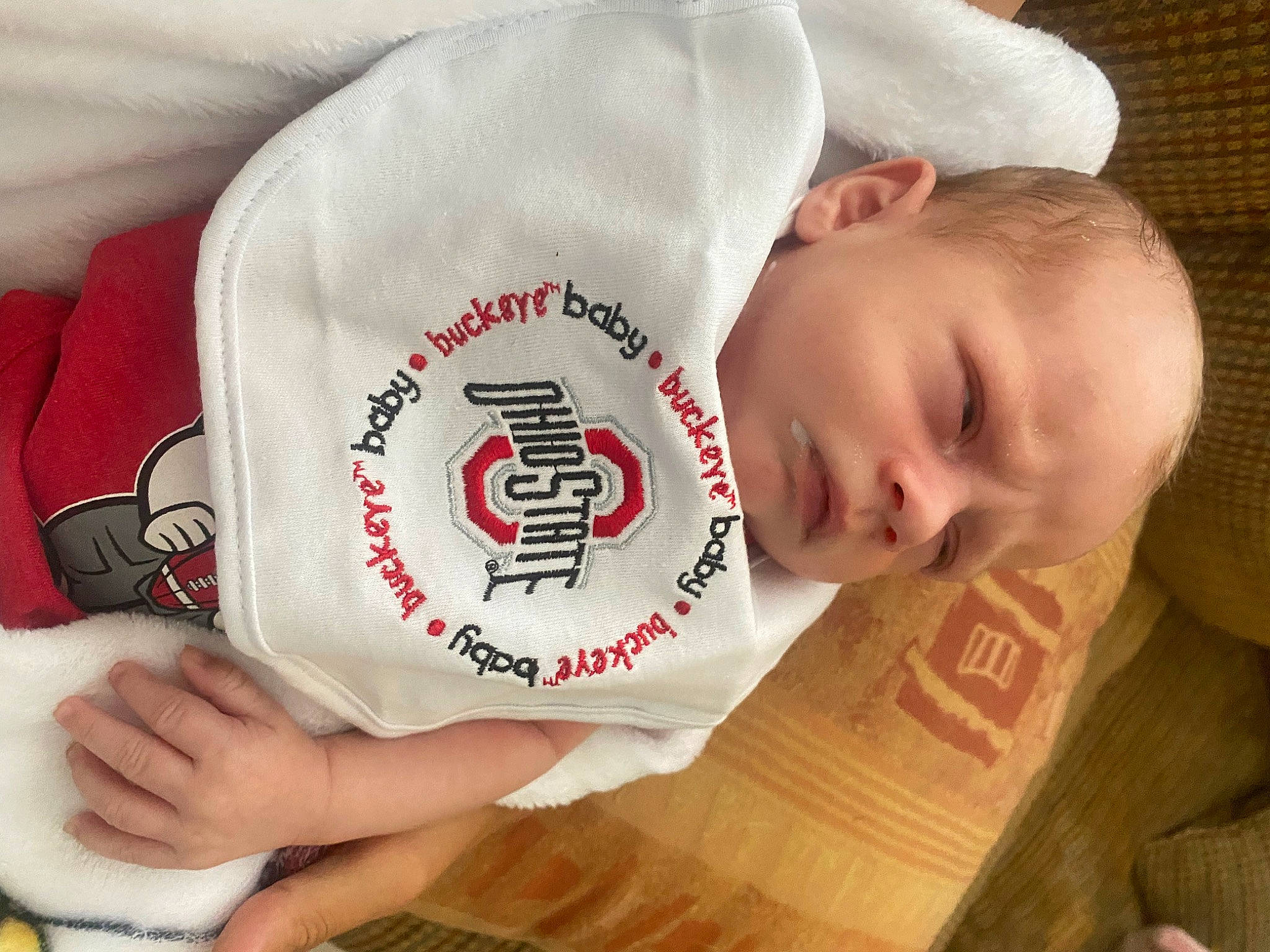 Jayveon joined the competition — help win amazing prizes! baby, baby_toddler_clothing, carmine, cheek, child, comfort, elbow, finger, flooring, hand, happy, hardwood, nail, person, product, sitting, sleeve, thumb, toddler, wood