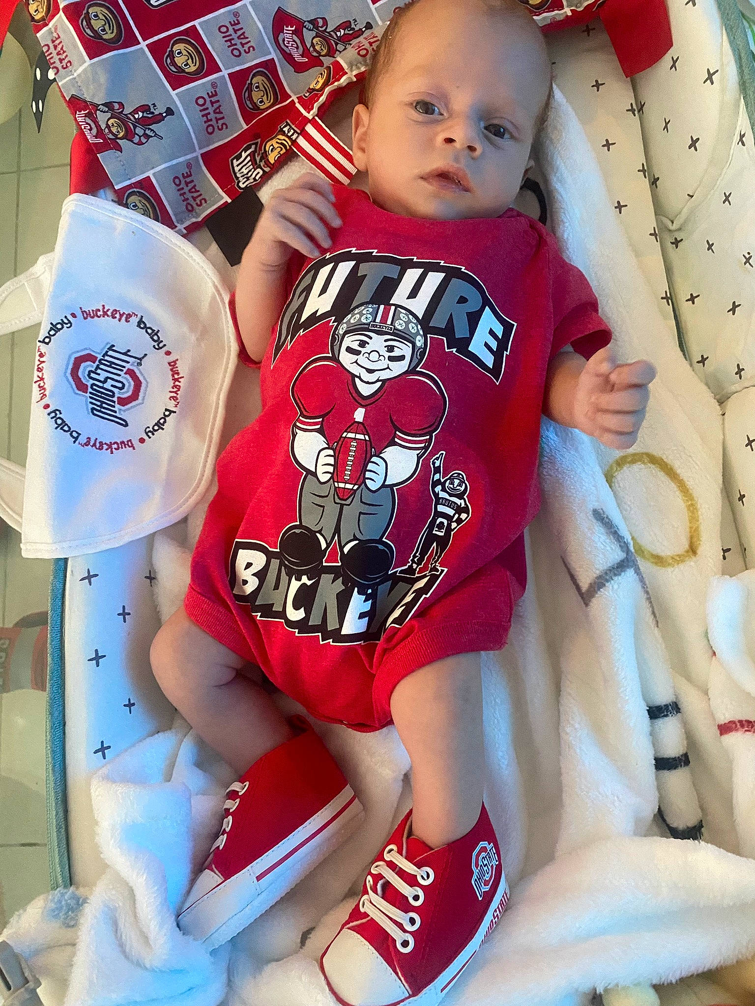 Jayveon joined the competition — help win amazing prizes! baby, baby_toddler_clothing, carmine, child, cool, font, happy, human_leg, jersey, linens, pattern, person, red, shorts, sitting, sleeve, sportswear, t_shirt, thigh, toddler