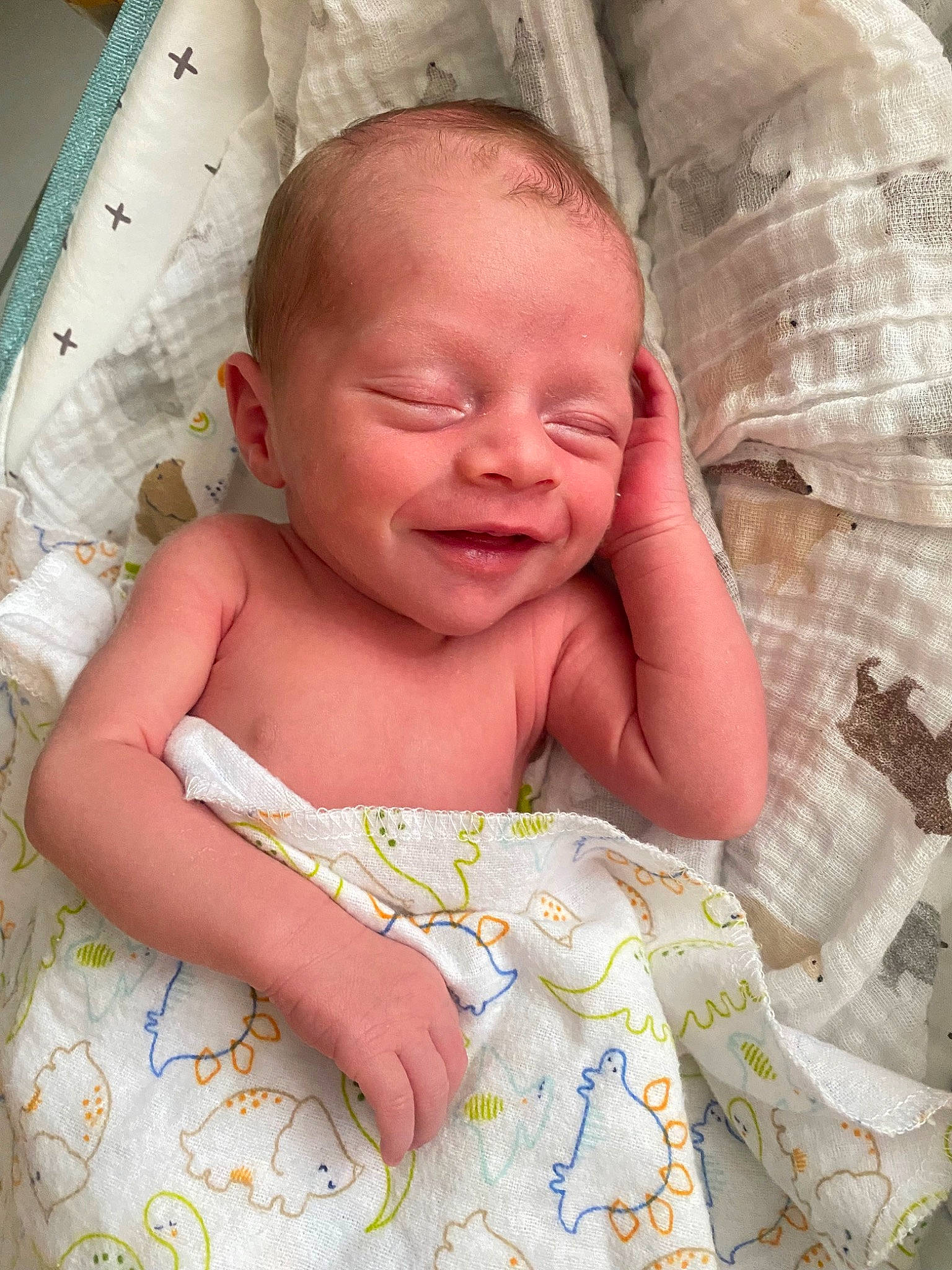 Jayveon is registered to the contest to win money with this photo: baby, baby_products, baby_toddler_clothing, bedding, cheek, child, comfort, event, facial_expression, finger, happy, iris, linens, pattern, person, pink, product, skin, smile, textile