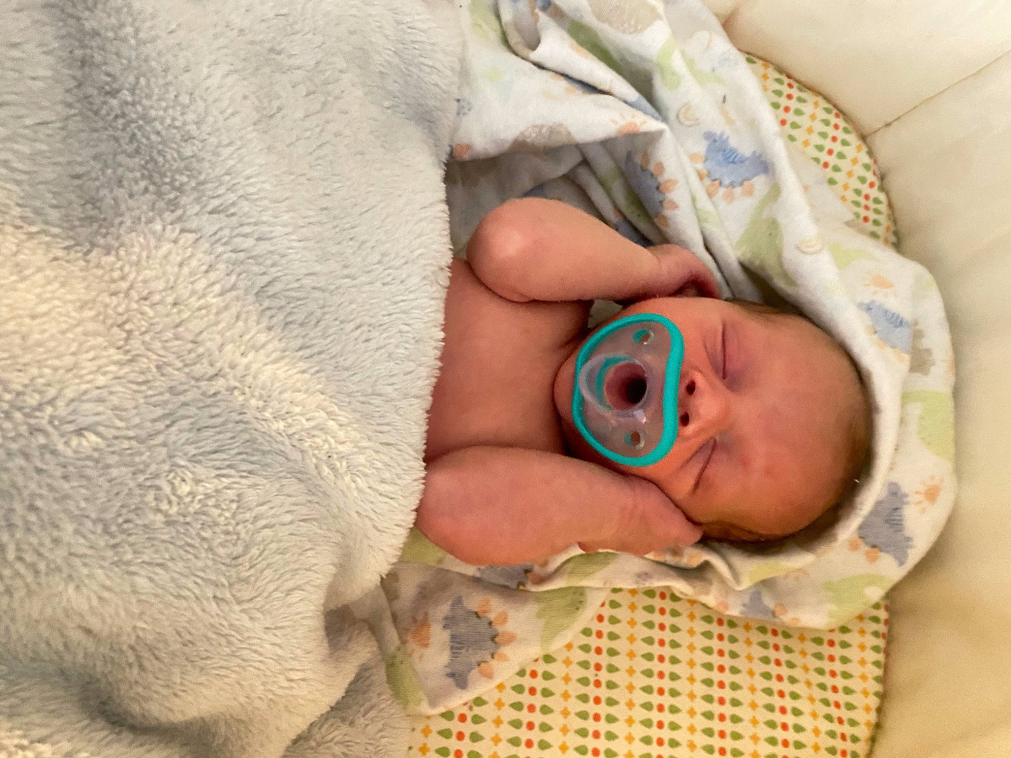 Jayveon is registered to the contest to win money with this photo: baby, baby_products, baby_sleeping, baby_toddler_clothing, bedding, bedtime, blanket, child, comfort, finger, gesture, linens, nail, nap, person, room, skin, sleep, thumb, toddler