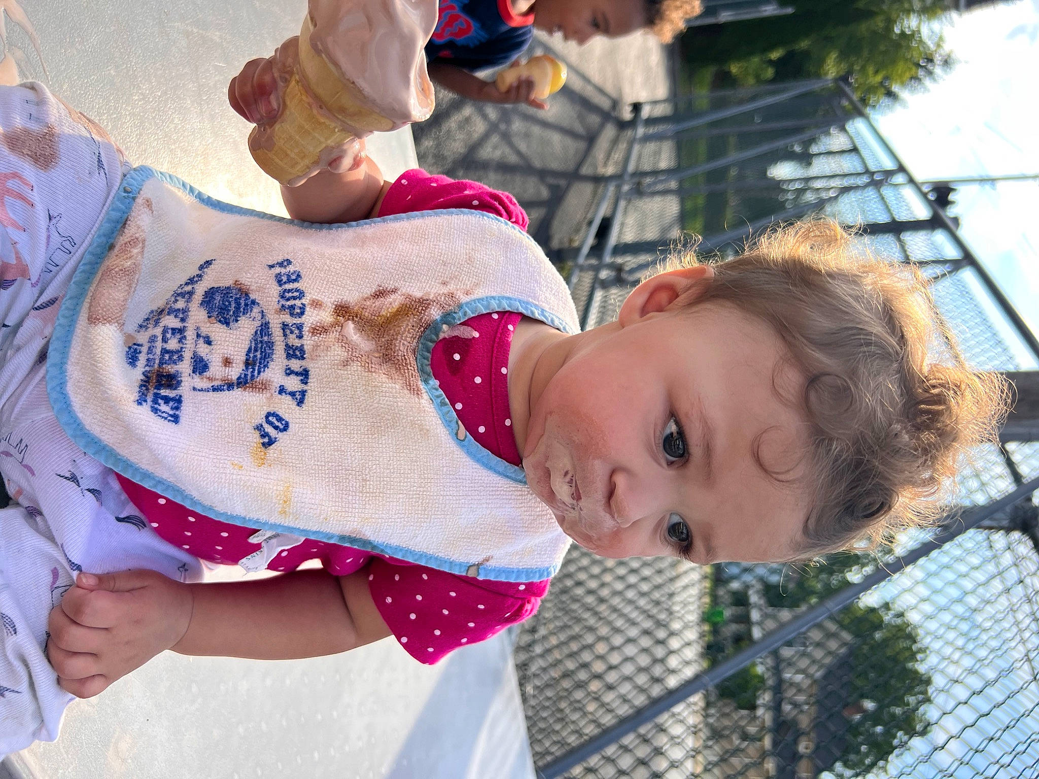 Kamora is registered to the contest to win money with this photo: child, event, fence, fun, happy, hat, leisure, mesh, pattern, person, plant, recreation, sky, toddler, tradition, tree, vacation, wire_fencing
