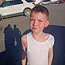 Hunter joined the competition — help win amazing prizes! child, boy, portrait, smiling, smirk, outdoor, parking_lot, vehicles, suv, van, sunlight, shadows, summer, white_shirt, short_hair, face, person, road, sky, photography