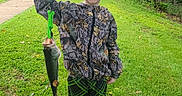 Hunter joined the competition — help win amazing prizes! child, boy, fishing, fish, angler, outdoor, grass, lawn, trees, nature, smiling, portrait, suburban, sidewalk, houses, stop_sign, jacket, camouflage, shorts, digital_scale