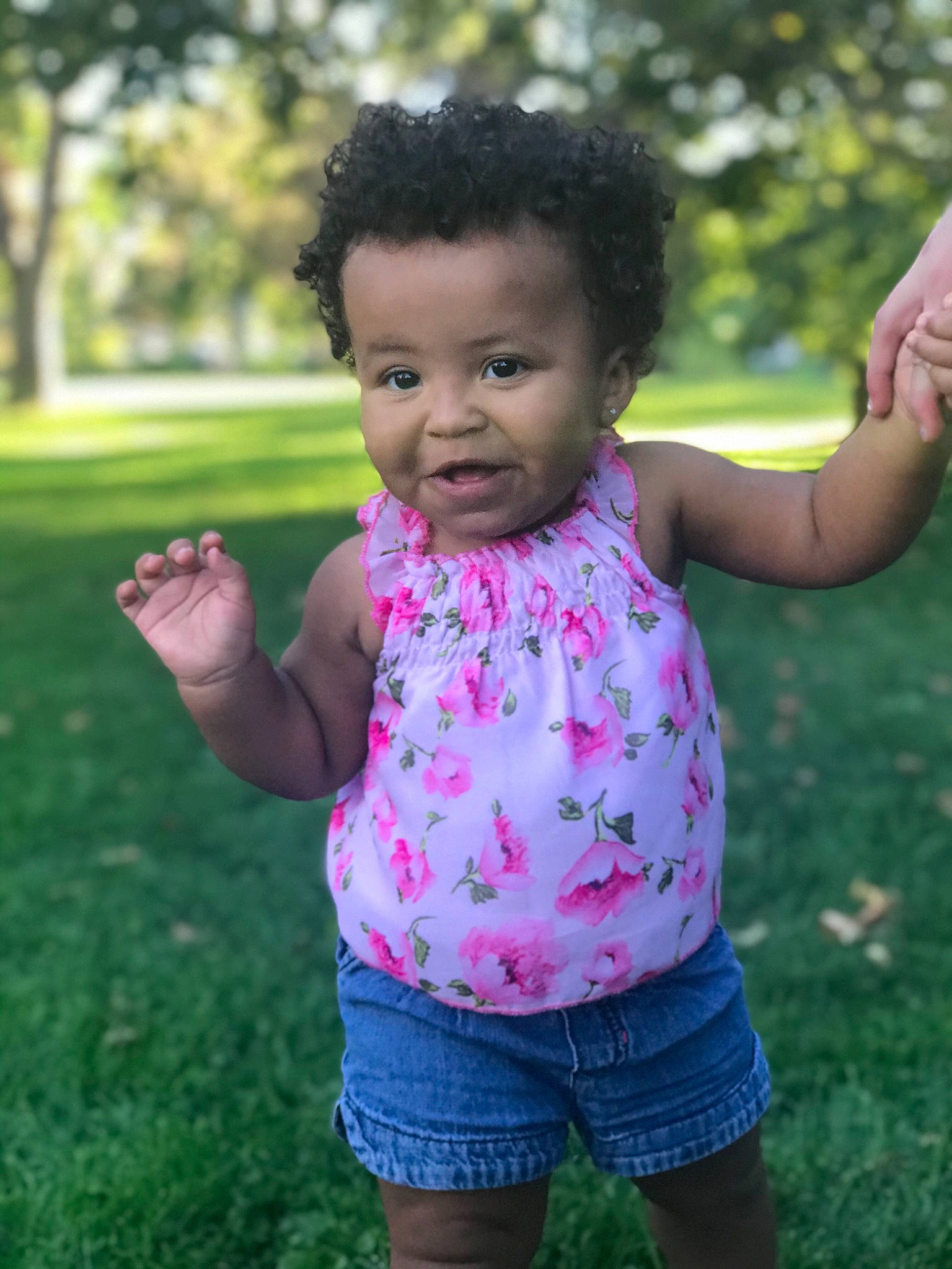 Kaliya joined the competition — help win amazing prizes! baby, child, finger, fun, gesture, grass, green, hand, happy, lawn, leaf, lip, person, pink, plant, play, skin, smile, summer, thumb