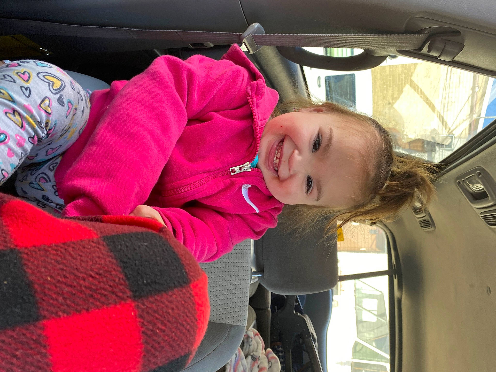 Meylanie is registered to the contest to win money with this photo: auto_part, automotive_design, automotive_exterior, car_seat, car_seat_cover, child, comfort, family_car, joy, motor_vehicle, passenger, pattern, person, personal_luxury_car, plaid, smile, tartan, toddler, vehicle, vehicle_door
