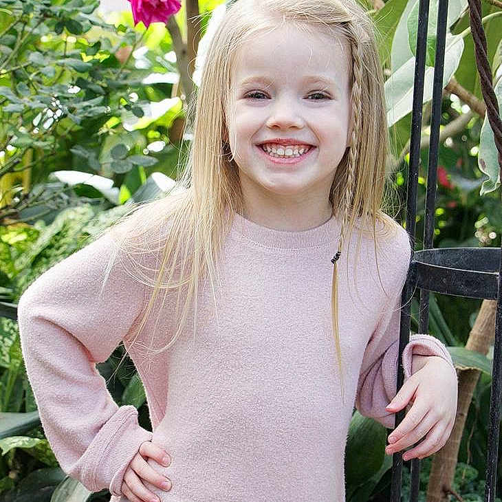 Kara joined the competition — help win amazing prizes! blond, child, child_model, eye, facial_expression, flower, fun, girl, grass, hair, happiness, human_hair_color, joy, long_hair, neck, person, plant, portrait_photography, shoulder, smile