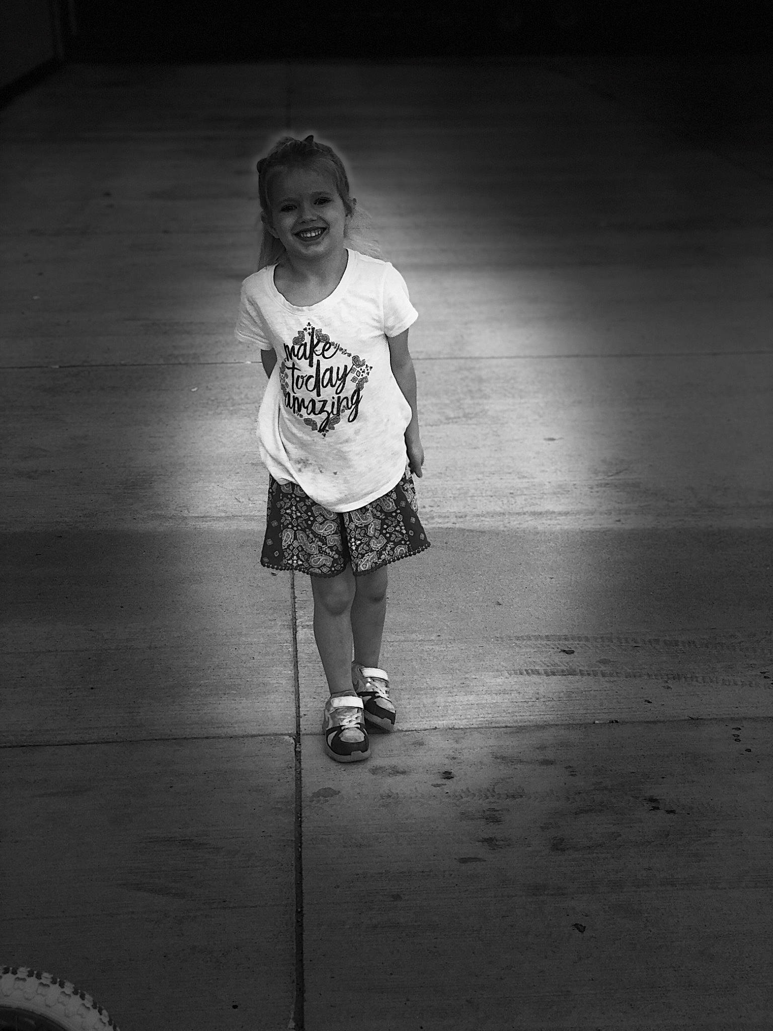 Kara is registered to the contest to win money with this photo: black, black_and_white, child, darkness, fun, girl, human, joy, light, monochrome, monochrome_photography, person, photograph, photography, shadow, snapshot, standing, style, water, white