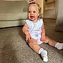 Navy joined the competition — help win amazing prizes! baby, child, indoor, carpet, socks, pink_bow, white_top, cute, happy, smiling, car_design, sitting, living_room, furniture, couch, carpeted_floor, person, portrait, young_child, cute_outfit