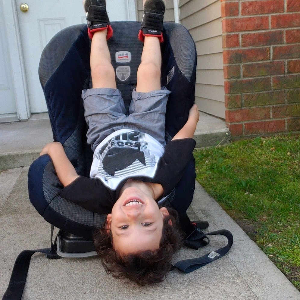 Caleb is registered to the contest to win money with this photo: chair, fun, furniture, hip, joint, knee, leg, leisure, shoulder, sitting