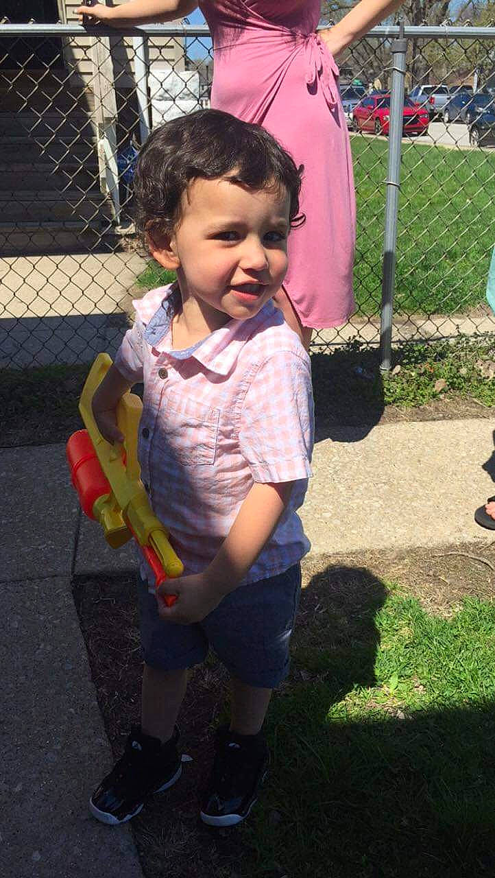 Caleb is registered to the contest to win money with this photo: child, fun, grass, leg, person, plant, play, playground, public_space, recreation, smile, toddler, tree