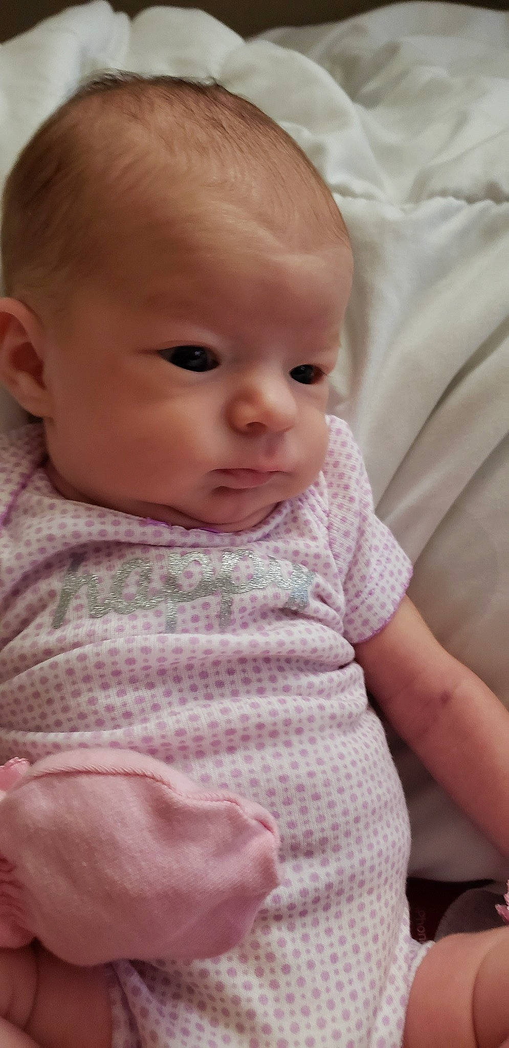 Kari is registered to the contest to win money with this photo: baby, cheek, child, chin, close_up, eye, face, forehead, head, iris, lip, mouth, nose, person, pink, skin, toddler