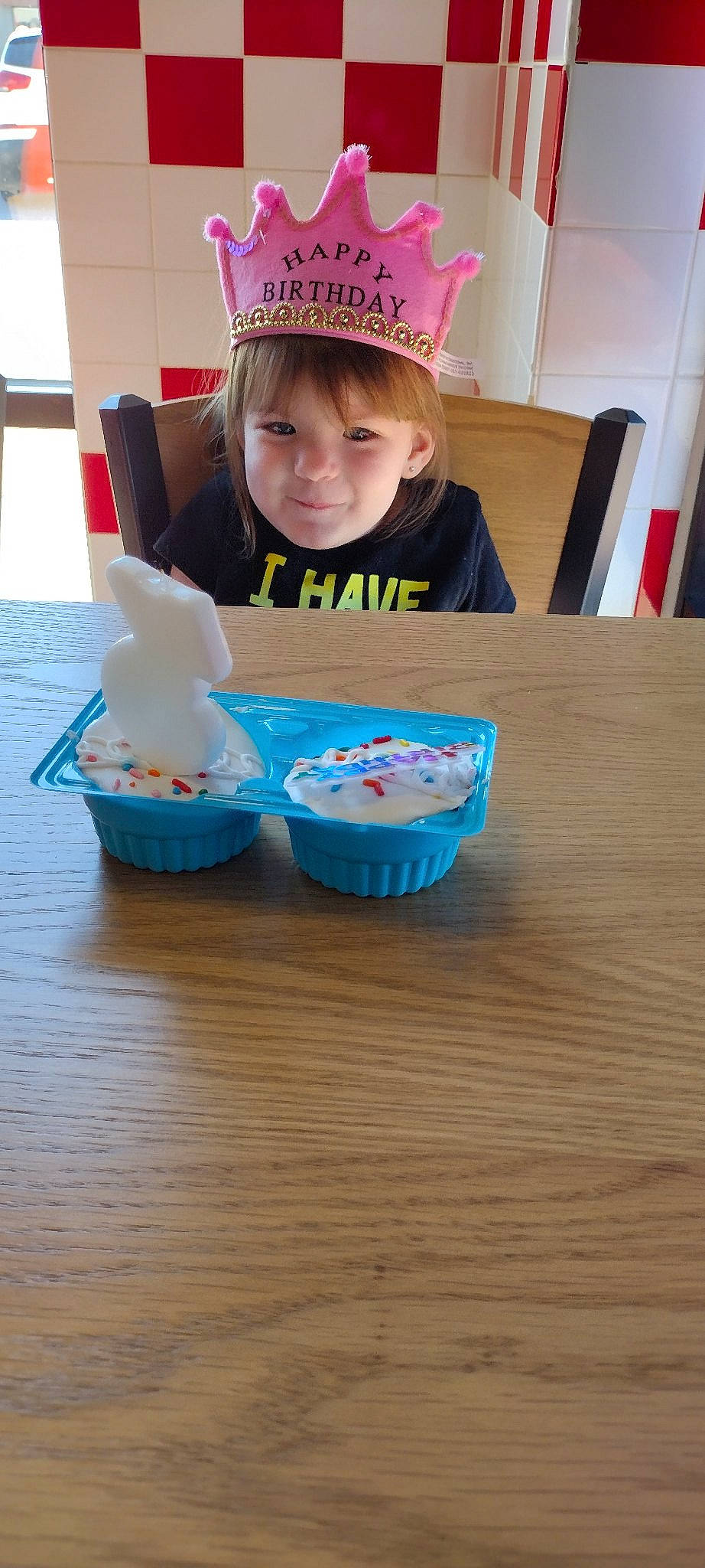 Kari joined the competition — help win amazing prizes! baking, child, comfort_food, event, flooring, food, fun, hardwood, hat, leisure, party_supply, person, play, recreation, sweetness, t_shirt, table, tire, toddler, wood