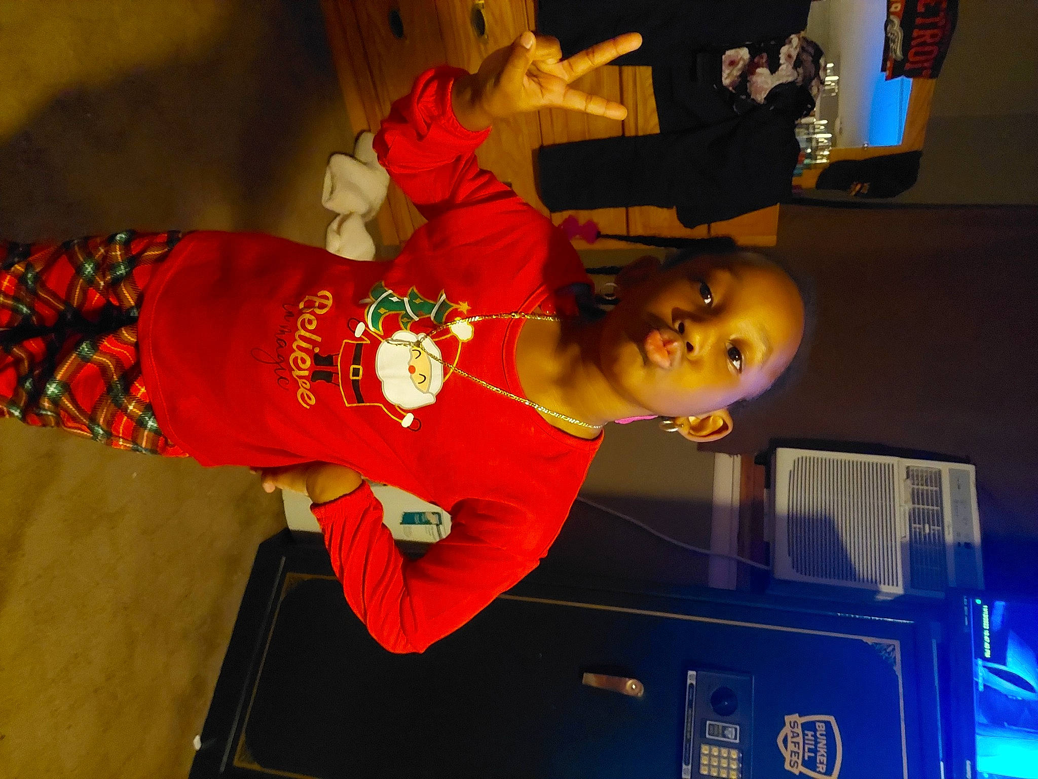 Rian is registered to the contest to win money with this photo: animation, electric_blue, event, fictional_character, fun, hat, person, room, sleeve, sportswear, t_shirt, world