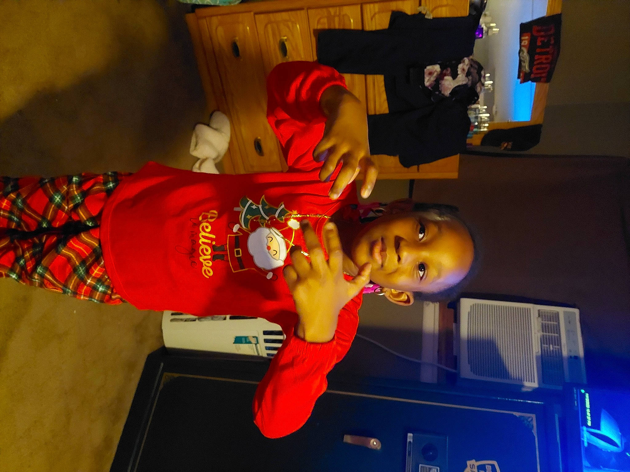 Rian is registered to the contest to win money with this photo: animation, child, costume, event, fun, hat, joy, machine, person, room, sleeve, smile, t_shirt, toddler, toy, wrist