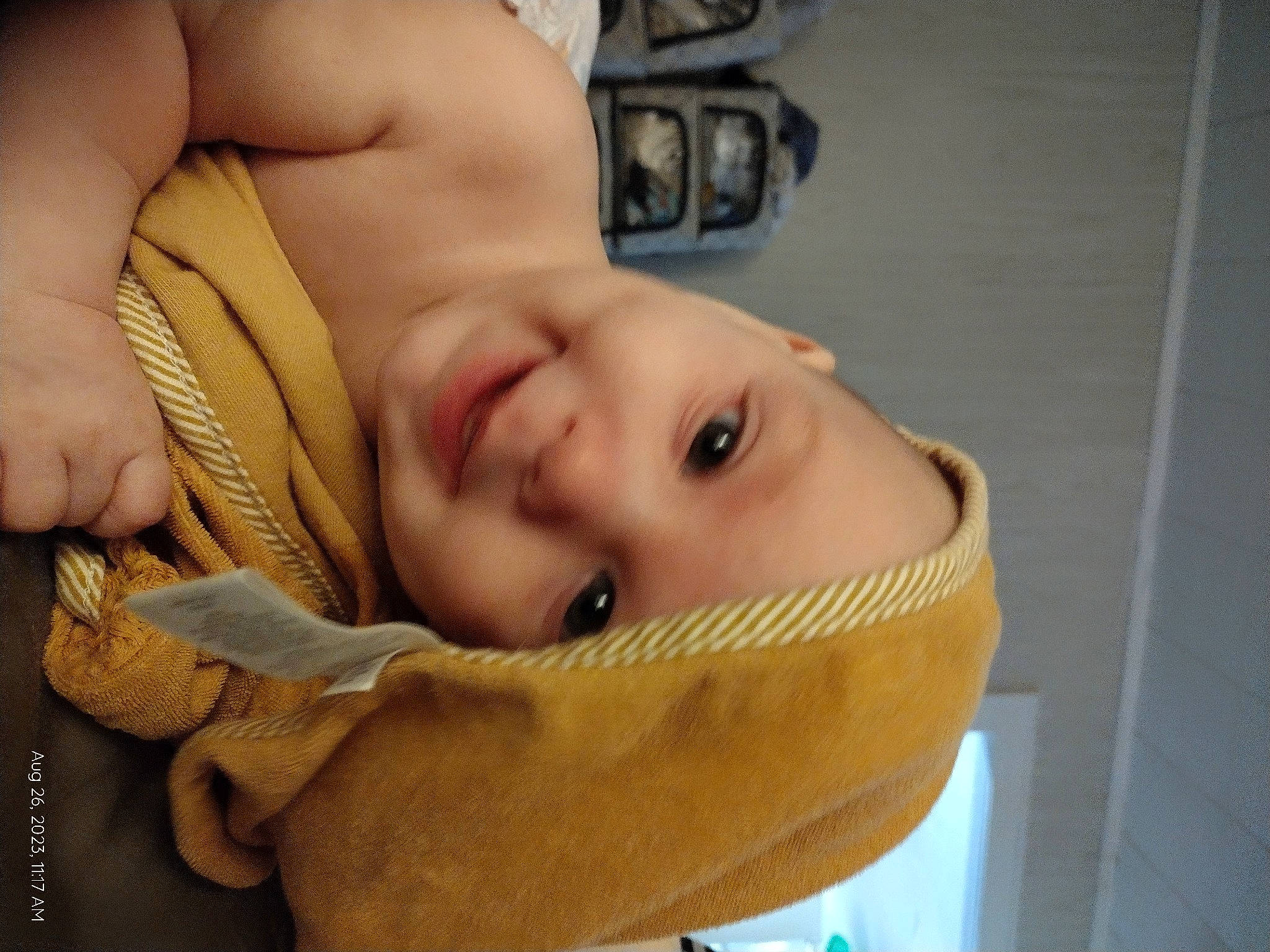 Koen is registered to the contest to win money with this photo: baby, baby_products, cheek, comfort, ear, eye, eyebrow, eyelash, gesture, happy, head, headwear, helmet, iris, jaw, lip, mouth, neck, nose, person