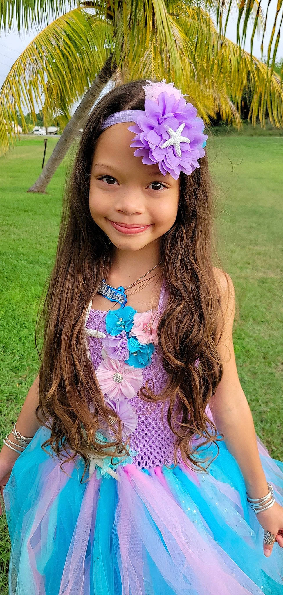 Sarai joined the competition — help win amazing prizes! blue, botany, day_dress, dress, face, facial_expression, grass, hairstyle, happy, headgear, iris, joy, magenta, person, petal, pink, plant, purple, skin, smile