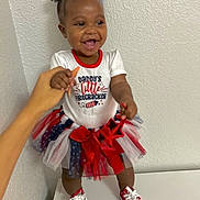 Ahmaya joined the competition — help win amazing prizes! toddler, child, smile, happy, standing, hand, tutu, sneakers, red, white, blue, clothing, person, indoor, wall, texture, celebration, cute, fashion, support