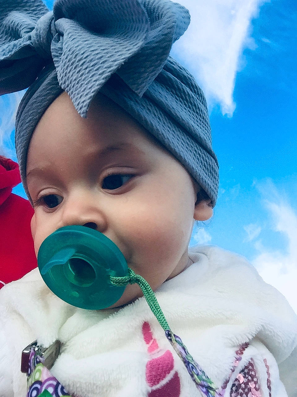 Olivia is registered to the contest to win money with this photo: baby, baby_products, baby_toddler_clothing, beanie, bonnet, cheek, child, cool, headgear, headwear, hood, knit_cap, lip, person, portrait_photography, stuffed_toy, textile, toddler, winter, wool