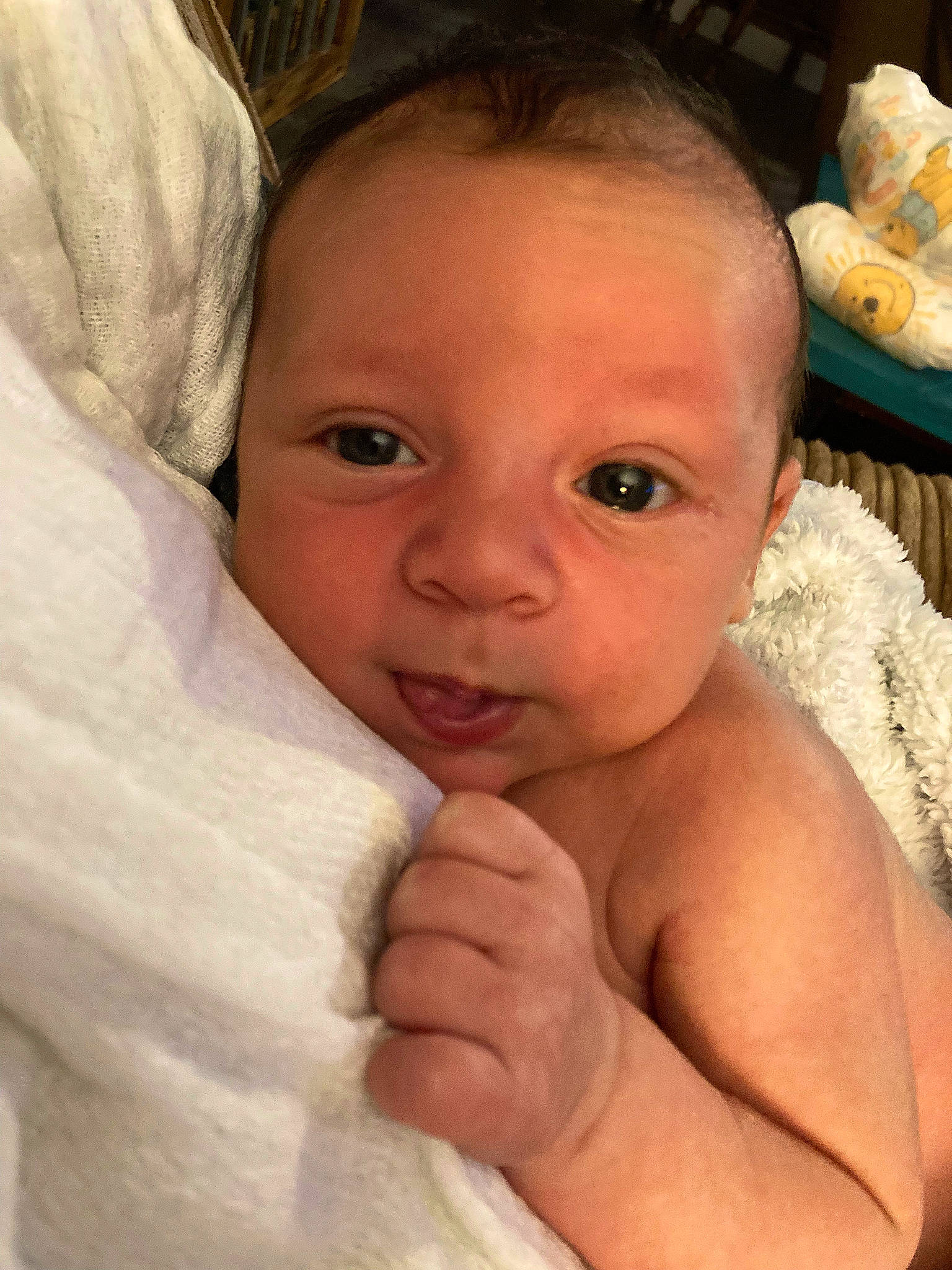 Jaxson is registered to the contest to win money with this photo: arm, baby, cheek, chin, ear, eye, eyebrow, eyelash, face, finger, gesture, hand, head, iris, lip, mouth, nose, person, skin, smile