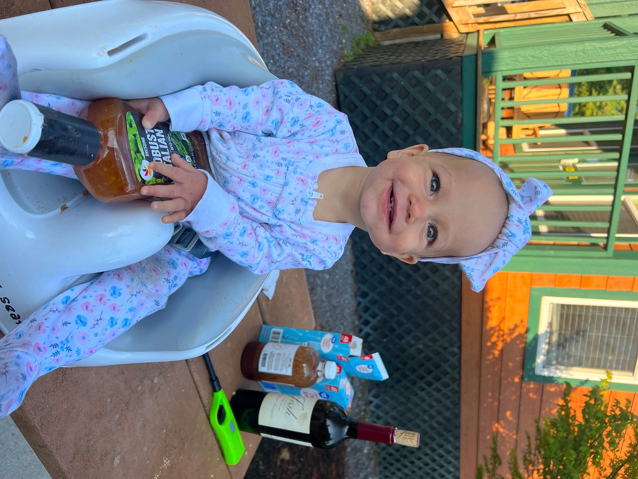 Liliana is registered to the contest to win money with this photo: baby, baby_products, baby_toddler_clothing, child, fun, happy, hat, joy, leisure, person, plant, play, room, sitting, smile, toddler, toy, vacation, wood