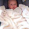 Timothé participe au concours pour gagner de l'argent avec cette photo : baby, blanket, bundle, car_seat, child, cozy, cushion, cute, expression, face, head, indoors, infant, person, safety, seat, soft, warm, white, wrapped