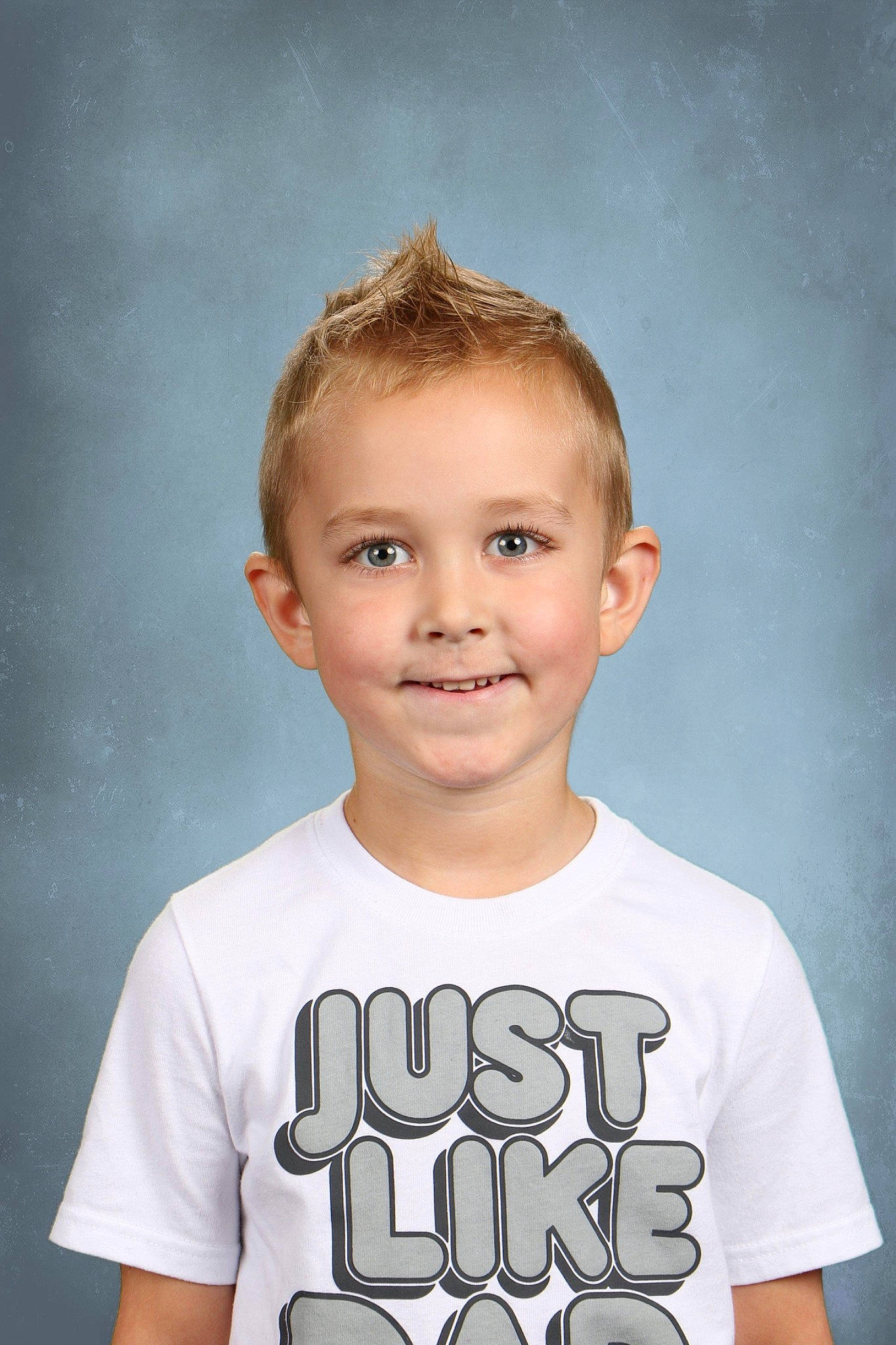 Kaiden is registered to the contest to win money with this photo: active_shirt, cheek, child, chin, cool, electric_blue, eyebrow, flash_photography, forehead, gesture, hairstyle, happy, human_body, jaw, joy, neck, person, sleeve, smile, standing