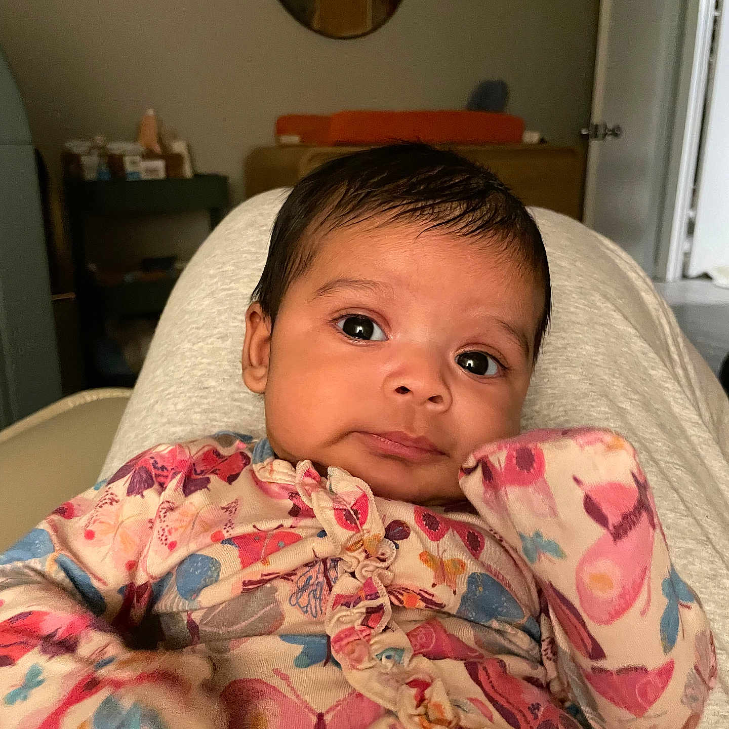 Xolani Wilkerson joined the competition — help win amazing prizes! baby, butterfly, child, clothing, cute, door, expression, eyes, face, furniture, hair, hand, indoor, infant, mirror, patterned_clothing, person, portrait, resting, skin